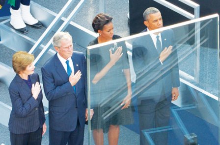 obama-va-bush_AFP